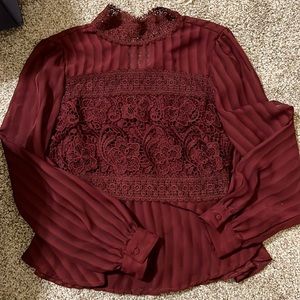 Peplum long sleeve top